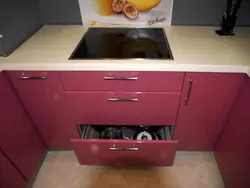 Cooktop and cabinet photo in the kitchen