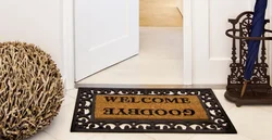 Door mat in apartment photo