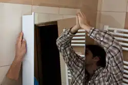 How to hang a mirror in the bathroom photo