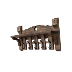 Photo of wall-mounted wooden clothes hangers in the hallway