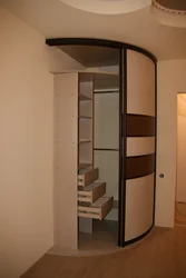 Semicircular corner wardrobe in the hallway photo