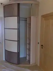 Semicircular corner wardrobe in the hallway photo