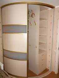 Semicircular corner wardrobe in the hallway photo
