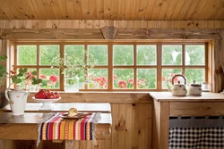 Photo of a kitchen in a country house with a window
