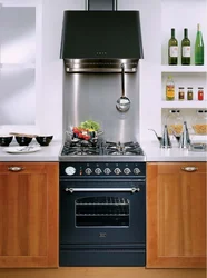 Gas stove in the interior of a small kitchen photo