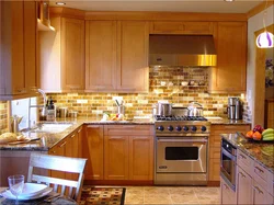 Gas stove in the interior of a small kitchen photo