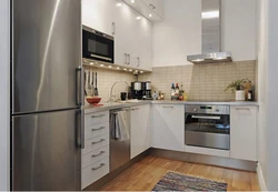 Gray refrigerator in the kitchen interior