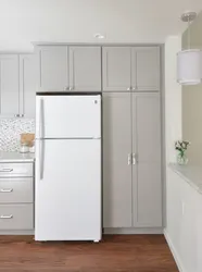 Gray refrigerator in the kitchen interior