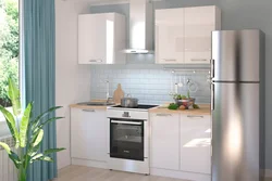 Gray refrigerator in the kitchen interior