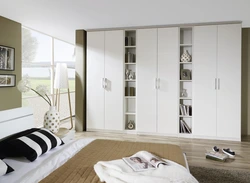 Hinged wardrobe in the living room in a modern style photo