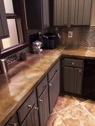 Kitchens with dark brown countertops photo