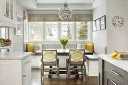 Kitchens on one wall with a corner photo