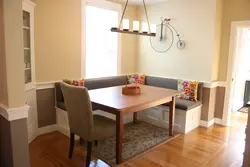 Kitchens on one wall with a corner photo
