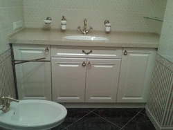 Bathroom cabinet with countertop photo