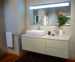 Bathroom cabinet with countertop photo