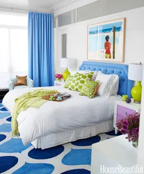 Blue bed in the bedroom interior