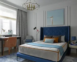 Blue bed in the bedroom interior