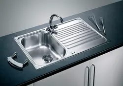 Photo of stainless steel kitchen sink