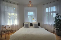 Bedroom design with corner window