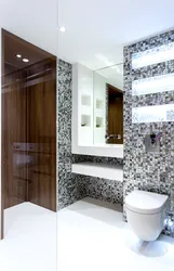 Mirror mosaic in the bath photo