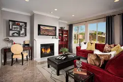 Bedroom design with sofa and fireplace