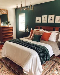 Emerald bed in the bedroom interior photo