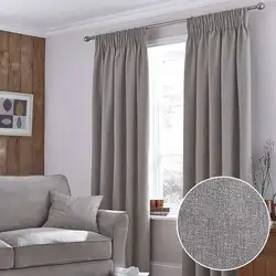 Tulle under linen in the living room interior