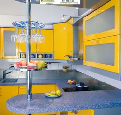 Blue kitchen with yellow photo