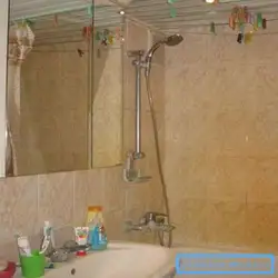 Lavabo fotosurati ustidagi banyoda oynani qanday osib qo'yish kerak