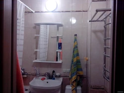 How to hang a mirror in the bathroom above the sink photo