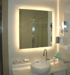 How to hang a mirror in the bathroom above the sink photo