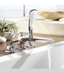 Bathroom faucet with shower built into the bathtub photo