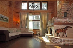 Living room in a wooden house with a stove photo