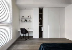 Built-in wardrobes in the bedroom up to the ceiling design