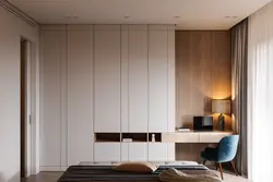 Built-in wardrobes in the bedroom up to the ceiling design