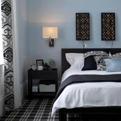 Bedroom interior with dark wall near the bed