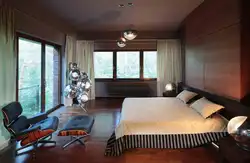 Photo of a bedroom in a house with one window in a modern style