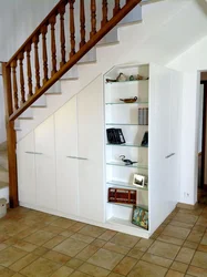 Dressing Room Under The Stairs In The House Photo