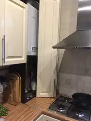 How to close the pipes in the kitchen in the corner photo
