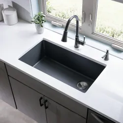 Black sink in the kitchen interior