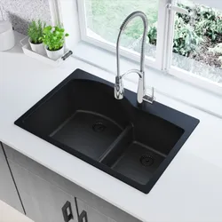 Black sink in the kitchen interior