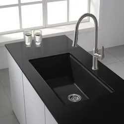 Black sink in the kitchen interior