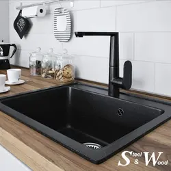 Oshxonaning ichki qismidagi qora lavabo