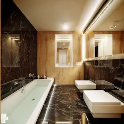 Bathroom design with dark tiles and wood