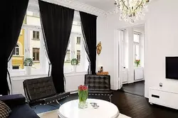 White walls in the living room interior curtains