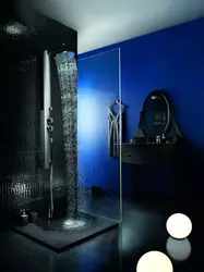 Photo of a bathroom with a black shower