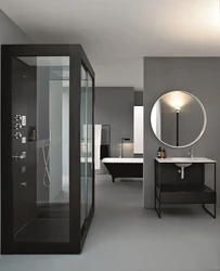 Photo of a bathroom with a black shower
