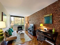 Brick walls in apartment interior photo