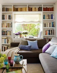 Cabinets by the window in the living room interior photo