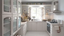 U-Shaped Kitchen With Sink By The Window Photo